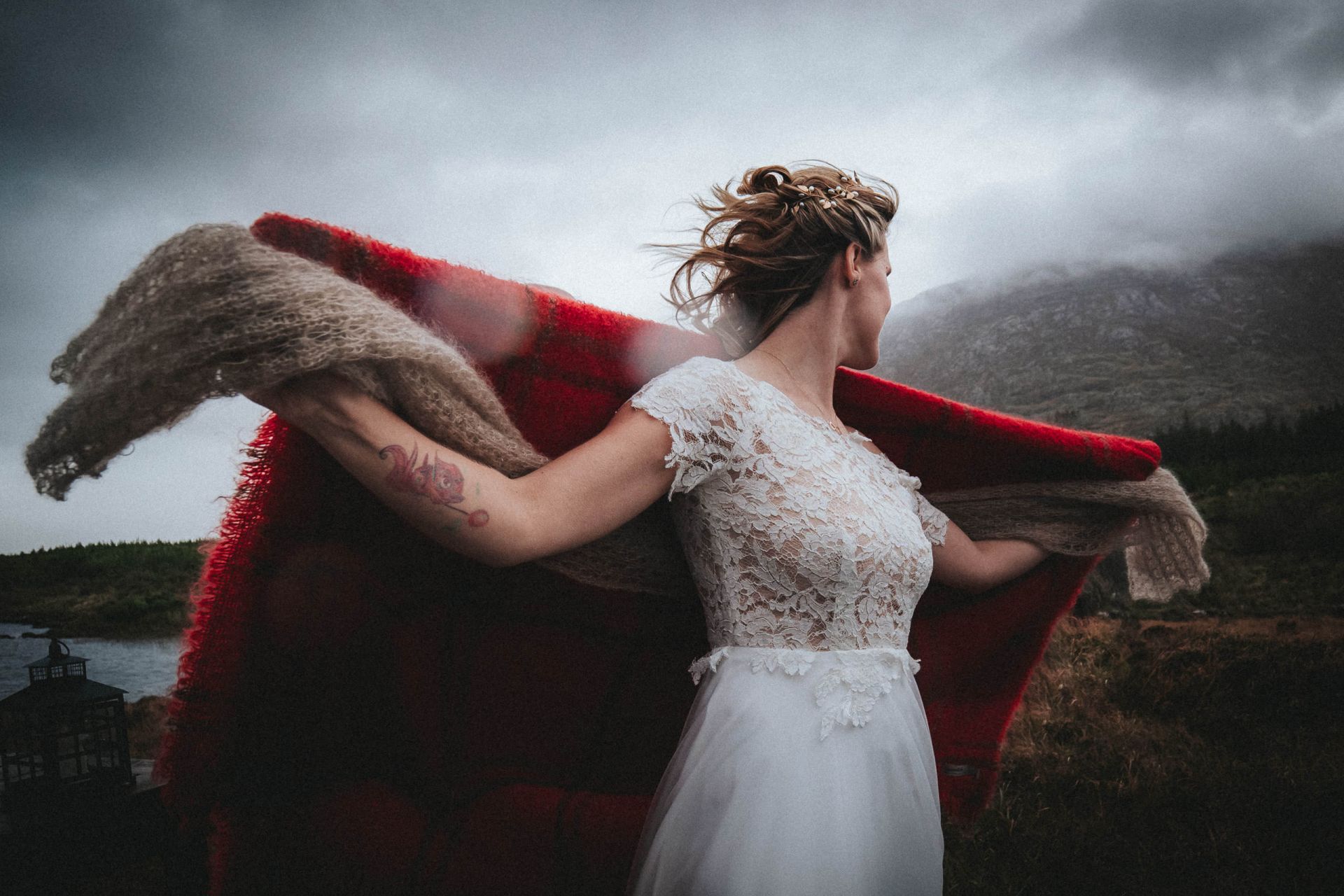 Bridal couple on a street in an Irish town at night