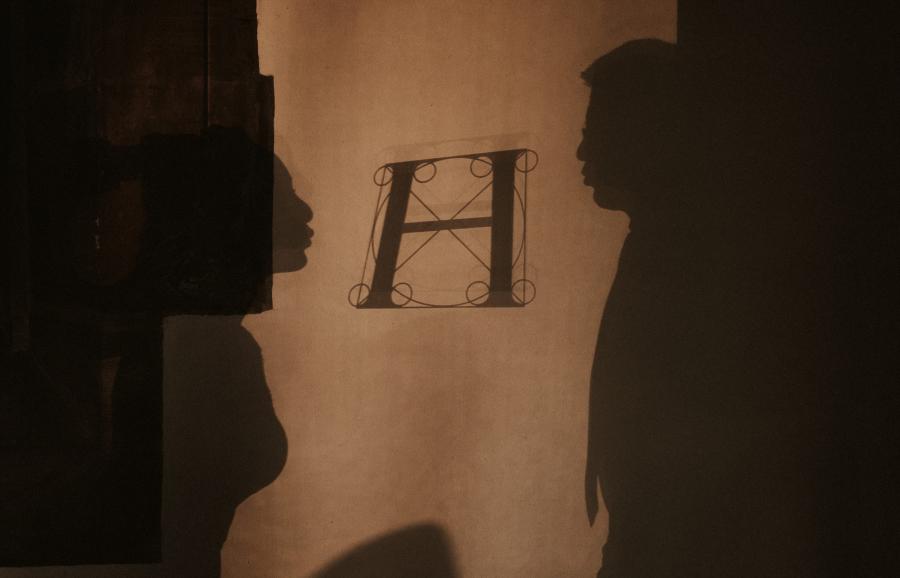 Silhouettes of bride and groom with the logo of Hotel Kloster Hornbach